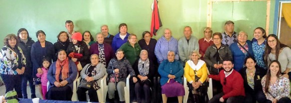 Encuentro comunitario con bandera chilena — organizaciones de Lebu